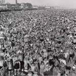 “Coney Island Beach” by Weegee, 1940
