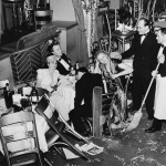 Original caption: “New York, NY: Employees of Bily Roses Diamond Horseshoe are shown trying to rouse a party of drowsy merry makers in order to proceed with their cleaning after a gay throng welcomed in the New Year” Corbis stock photo ID BE076357. © Bettmann/CORBIS.