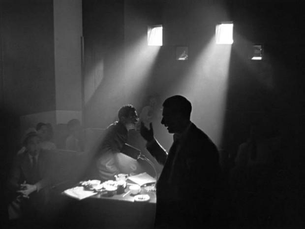 Movie still from Citizen Kane depicting extreme backlighting cinematic technique