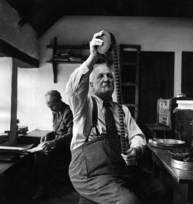 “10th September 1949:  US film director Robert Flaherty (1884 - 1951), who directed the film 'Man of Aran' in 1934, looking at some film during his return visit to the Aran Islands in County Galway.” Photo by Haywood Magee/Picture Post/Getty Images.