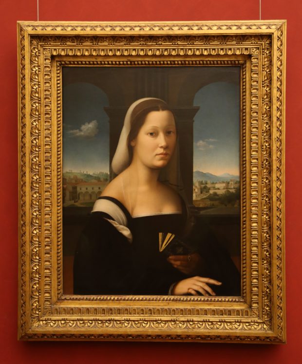 A painting by Ridolfo Ghirlandaio titled “La Monaca” from c. 1505-1515